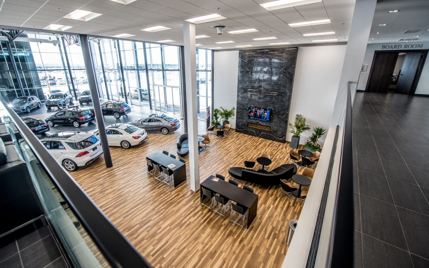 Overhead of customer area and showroom with cars at Mercedes-Benz Country Hills.