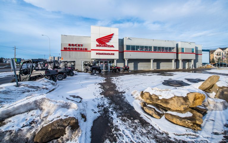 Exterior of building with snow on ground at Rocky Mountain Honda Powerhouse.