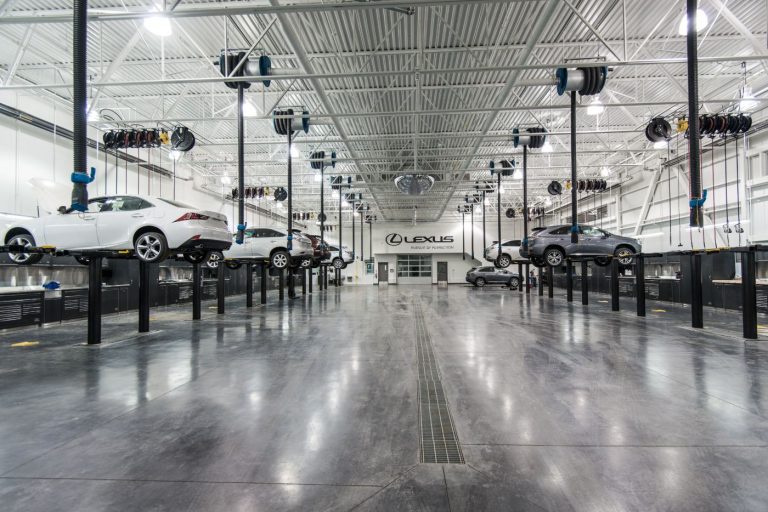 Lexus cars off the ground in the Service area at Lexus of Royal Oak.