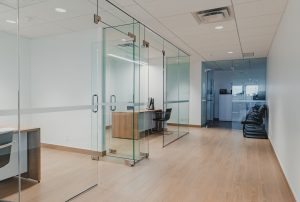 Sales offices with glass doors at Fifth Ave Volkswagen.